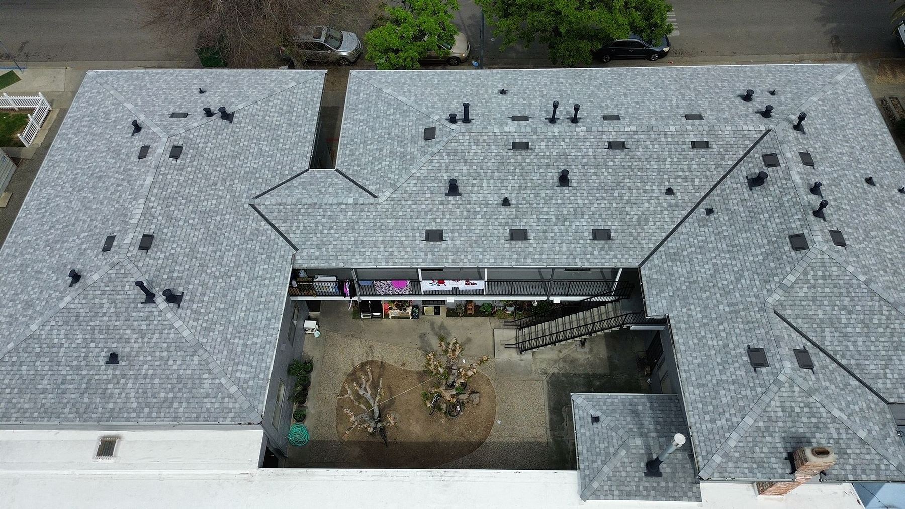 Multi-family shingle reroof — Keith Roofing residential project