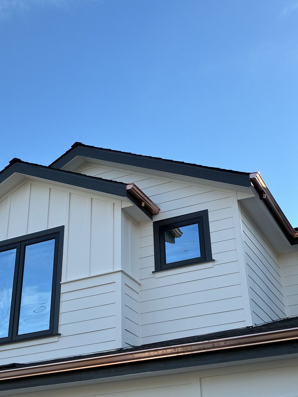 Campbell copper gutter and dormer detail at golden hour
