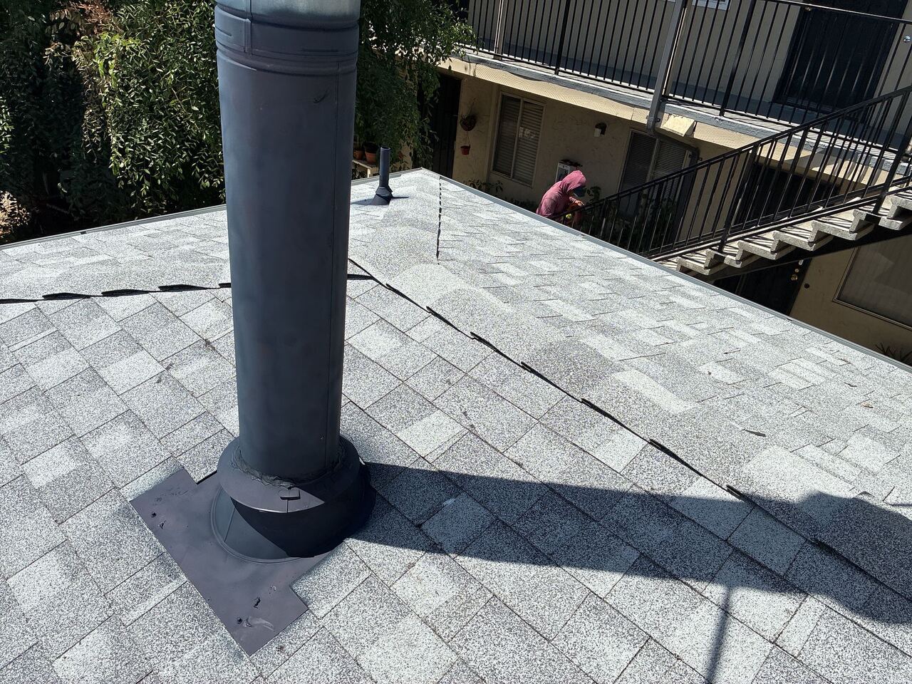 Furnace flue flashing detail on flat roof
