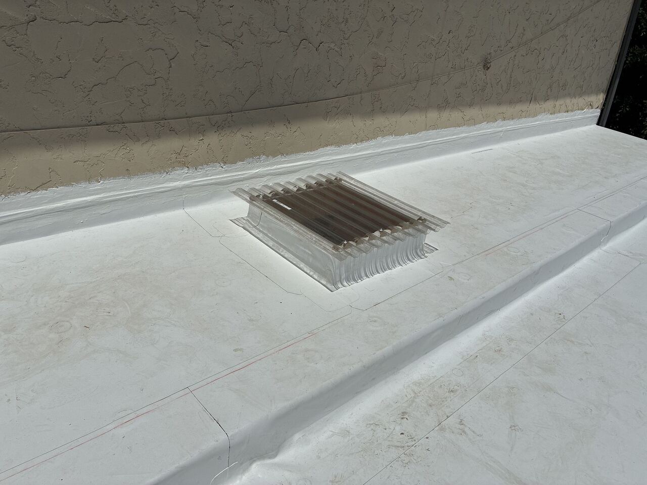 Parapet wall and skylight detail on multi-family flat section