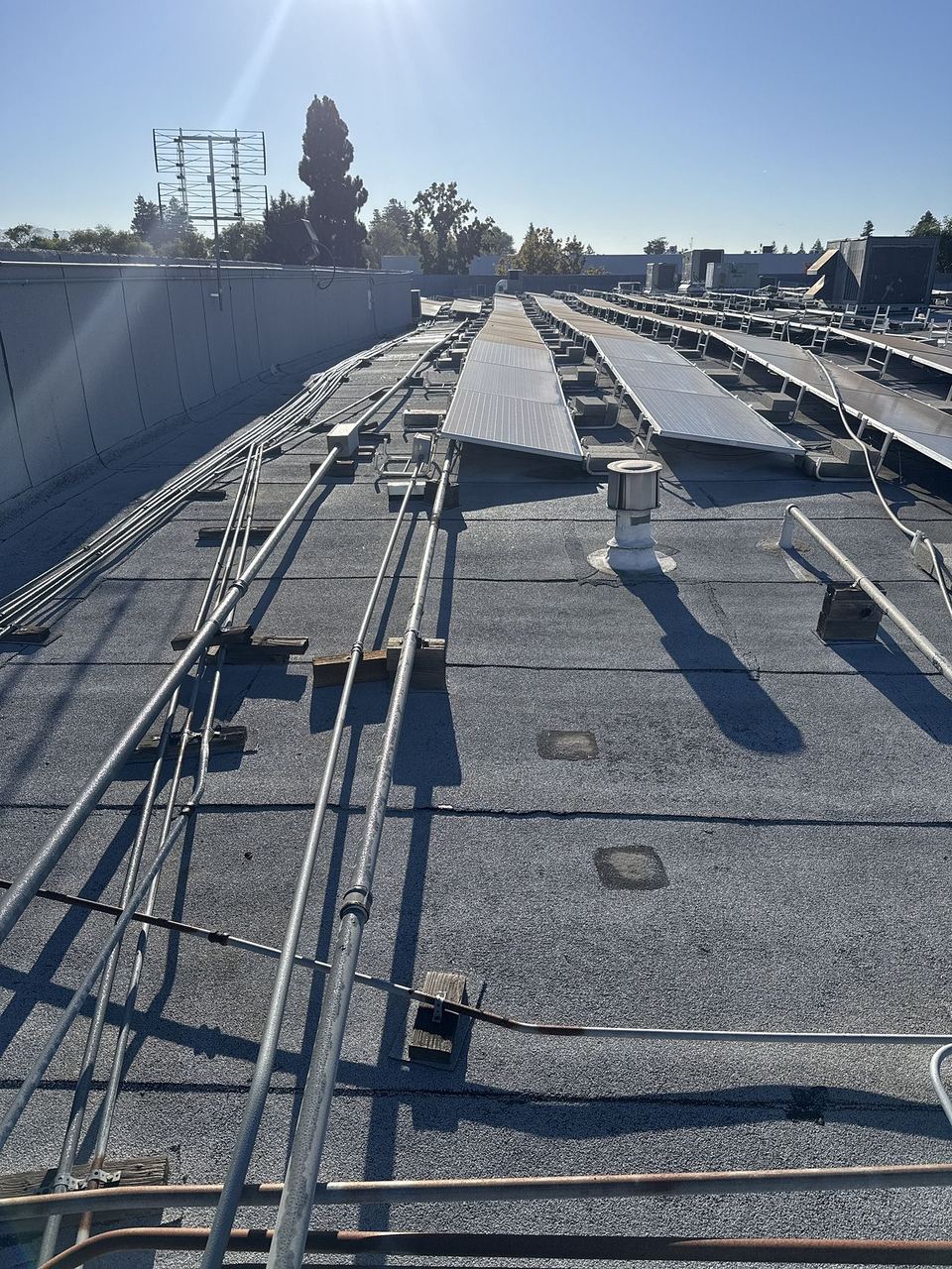 Flat roof penetrations and conduits — modified bitumen substrate
