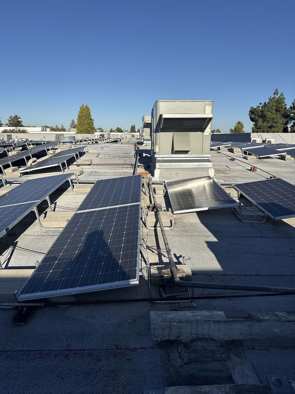 Commercial roof with HVAC and solar coordination