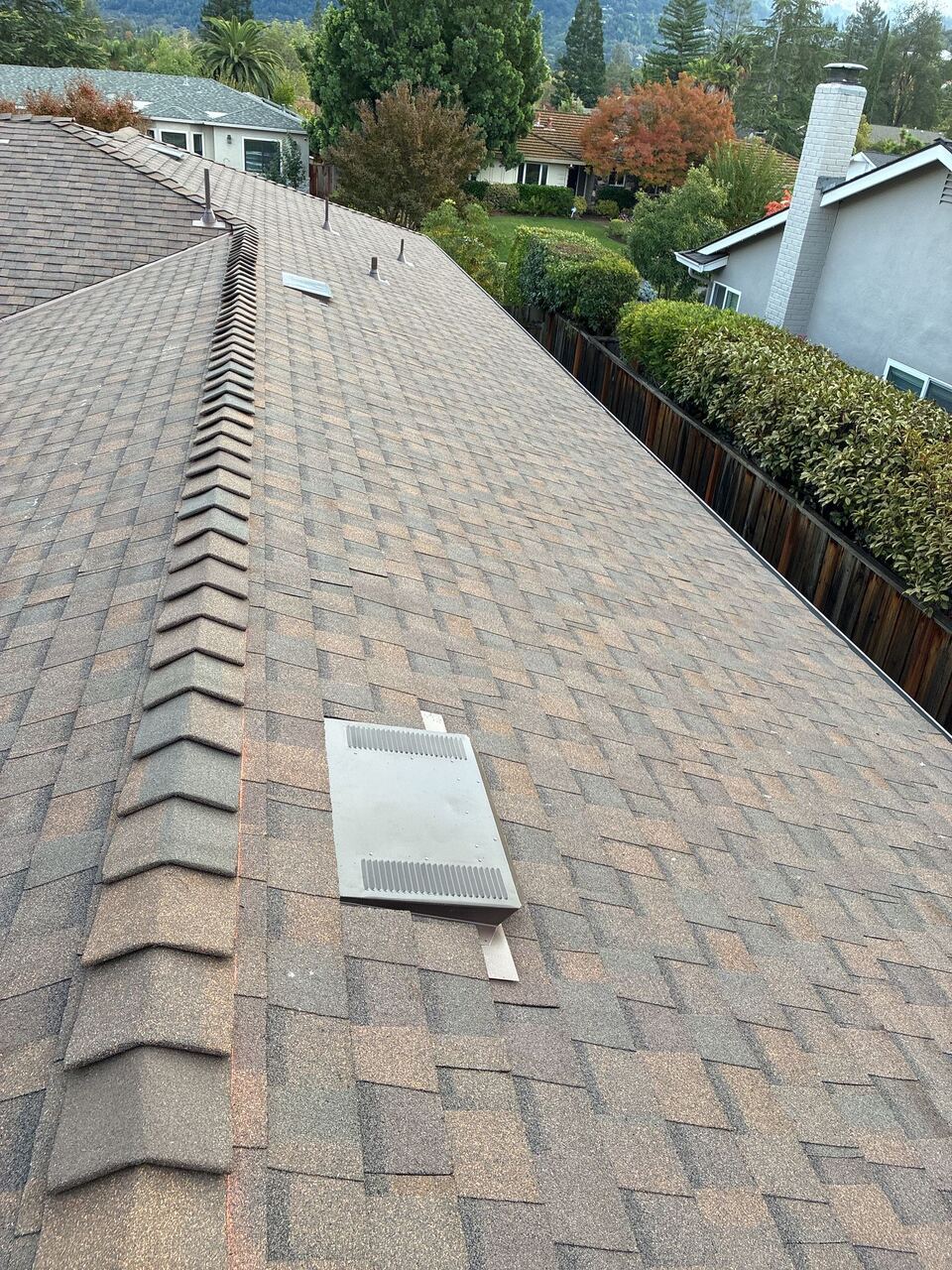 Ridge cap and box vent detail on architectural shingle install