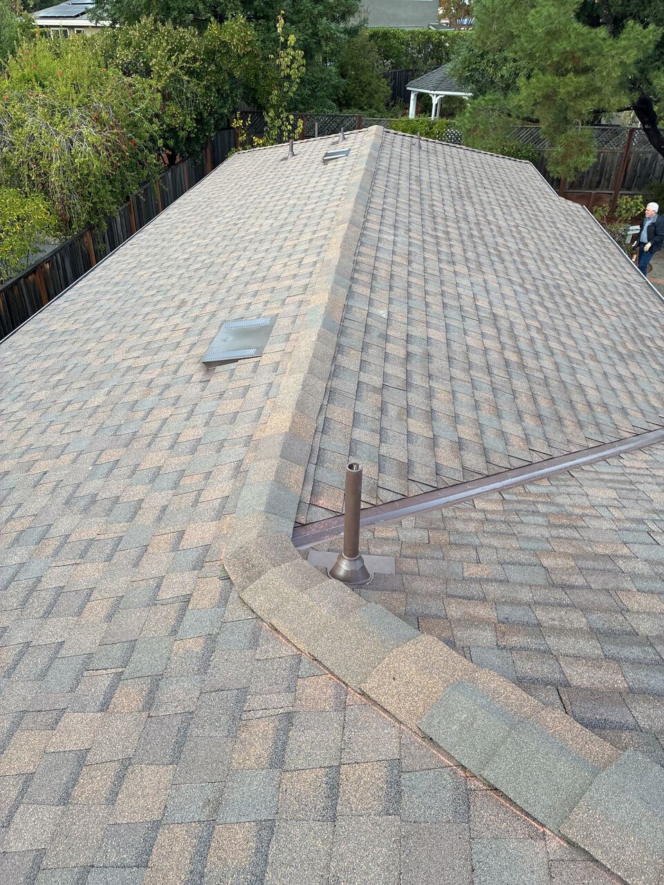 Ridge and valley transition detail on Landmark shingle roof