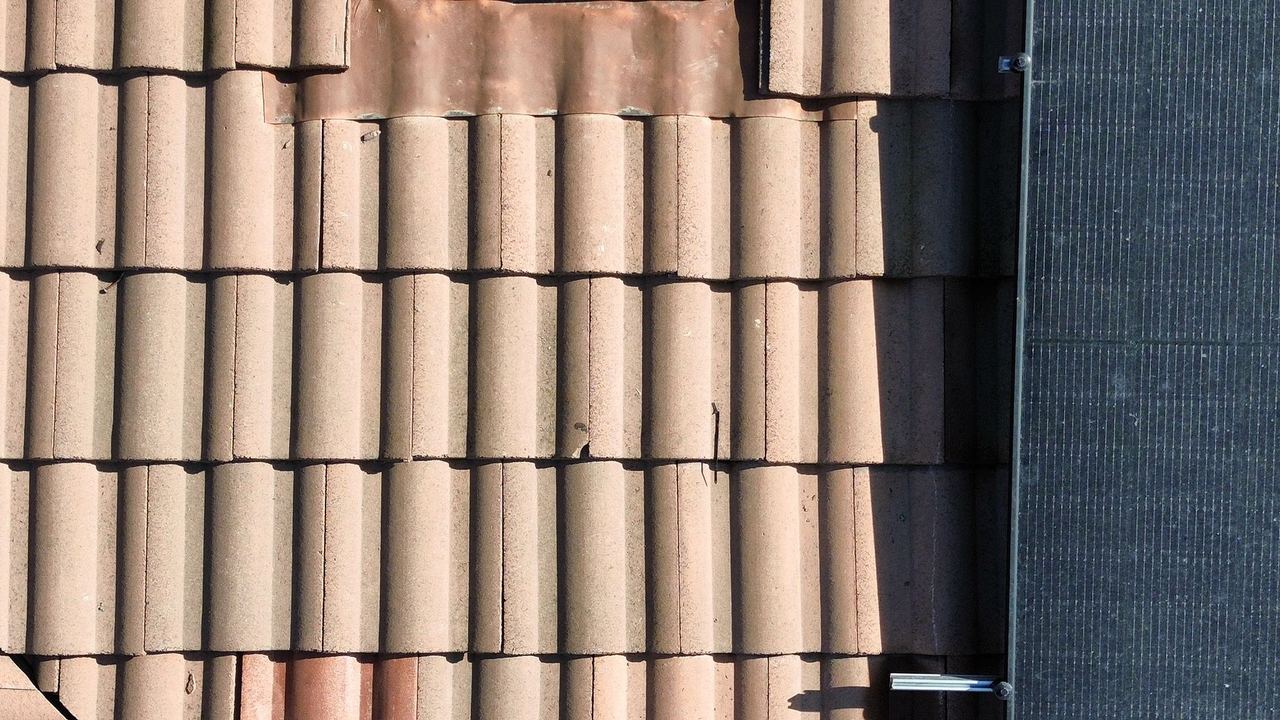Tile tie-in detail after fire damage repair