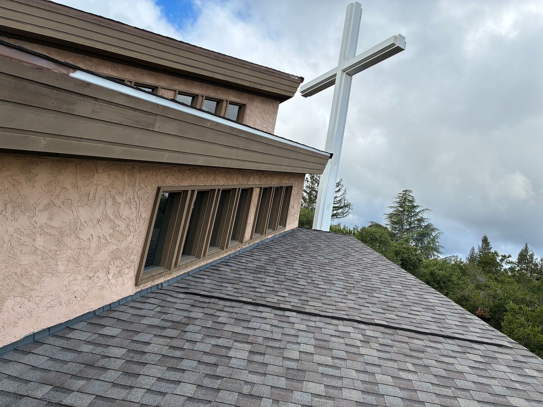 Commercial roof replacement in San Jose by Keith Roofing — new architectural shingle roof on a church reroof project
