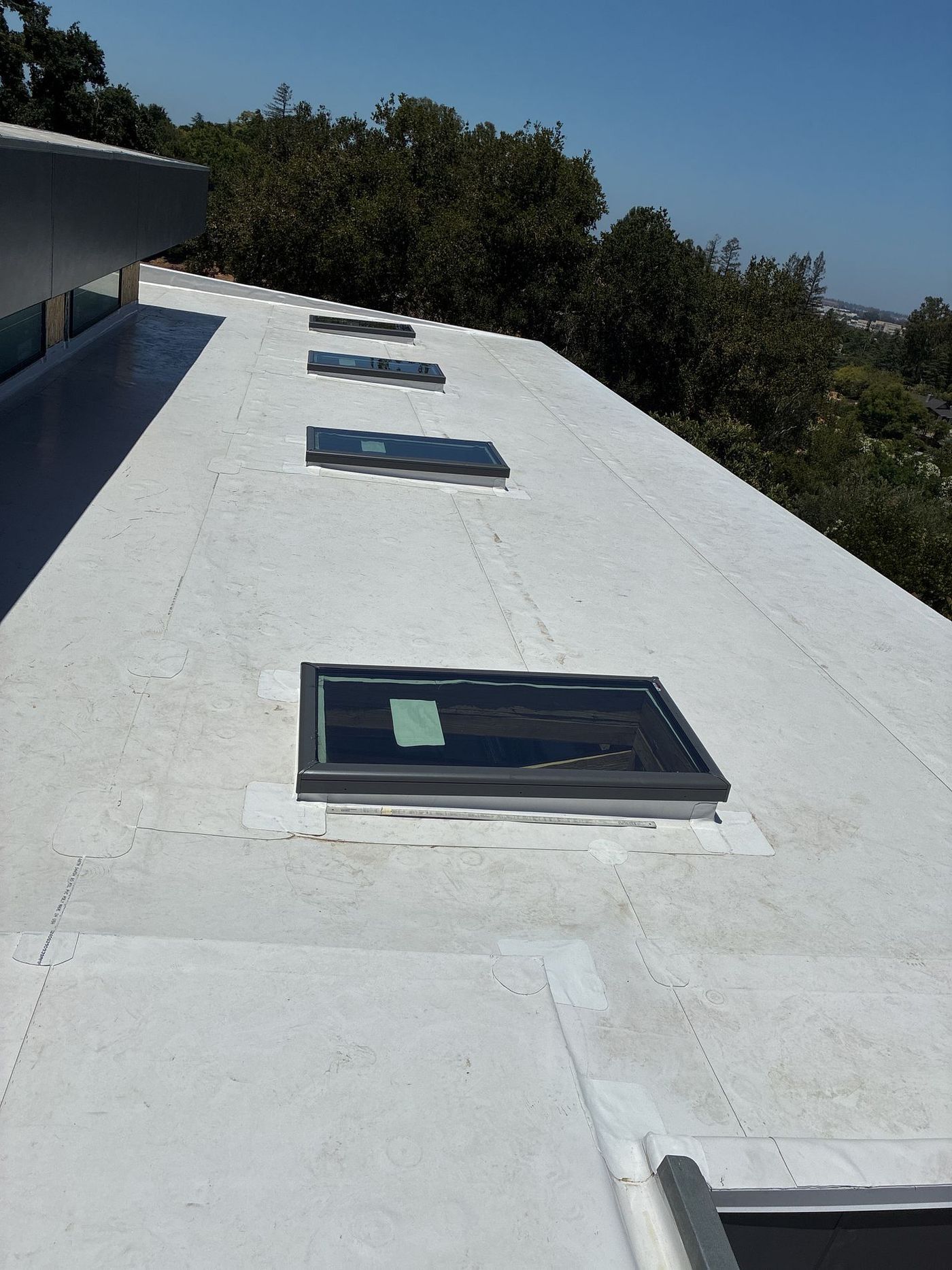 White TPO single-ply commercial roof in the Bay Area by Keith Roofing